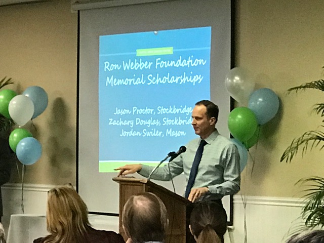 A scholarship donor speaks to the crowd about why he chooses to support the education of WTC students