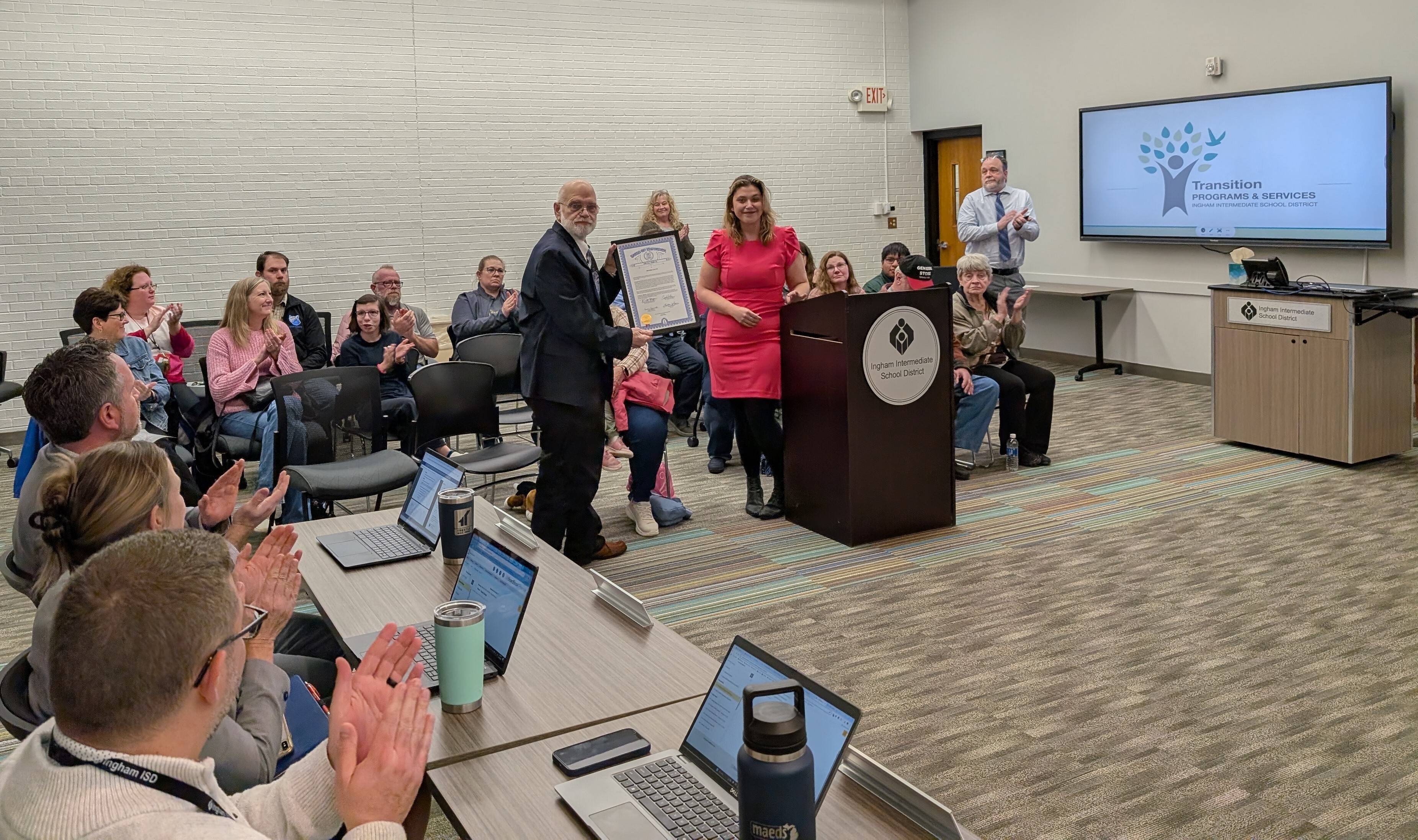 Denise Lycos being honored at the Board of Ed meeting